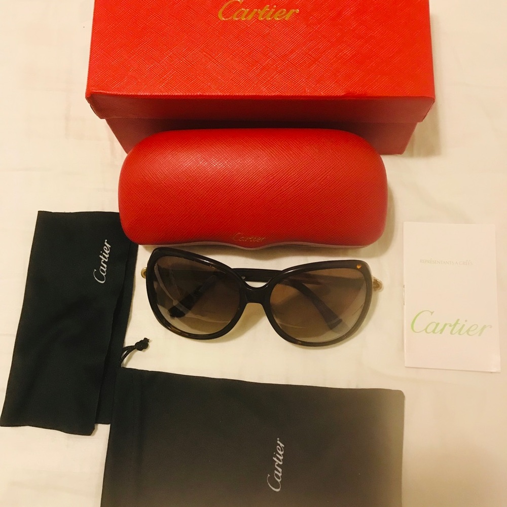 Cartier sunglasses brand new in original box.